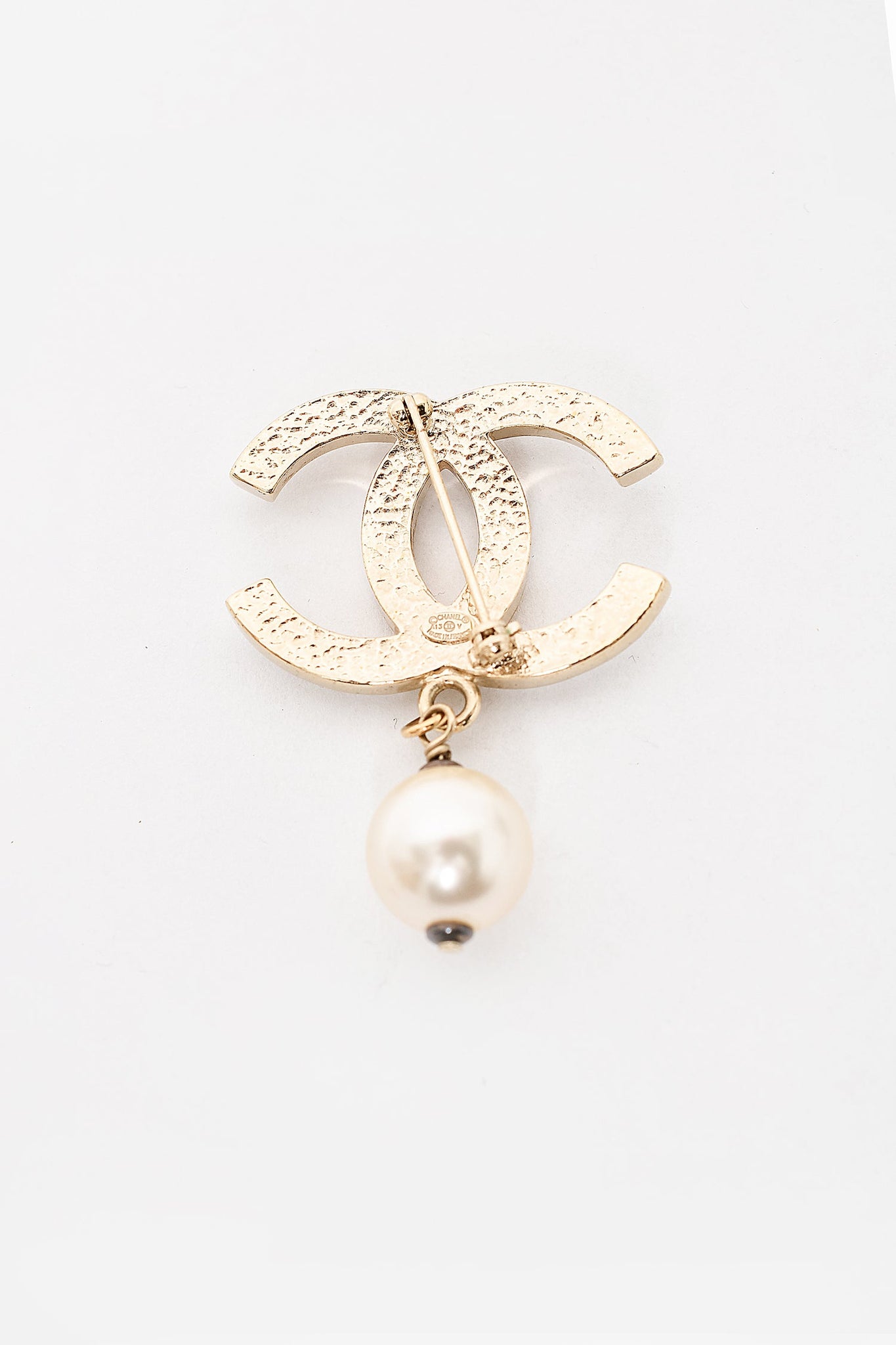 Sell & More Promotion ServicesChanel CC gold pearl brooch with