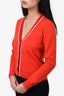 Pre-loved Chanel™ 2002 Orange Cashmere Sweater with Red Trim Size 38