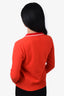 Pre-loved Chanel™ 2002 Orange Cashmere Sweater with Red Trim Size 38