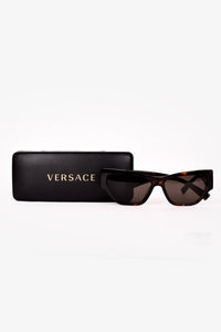 Embellished cat-eye sunglasses in black - Versace