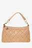 Pre-Loved Chanel™ 2003-04 Beige Quilted Leather Surpique CC Hobo Shoulder Bag