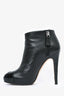 Pre-Loved Chanel™ Black Leather Heeled Booties with Patent Toe Cap Size 36 (As Is)