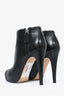 Pre-Loved Chanel™ Black Leather Heeled Booties with Patent Toe Cap Size 36 (As Is)