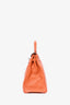 Hermès 2010 Orange Clemence Leather Kelly Retourne 35 Top Handle with Canvas Strap